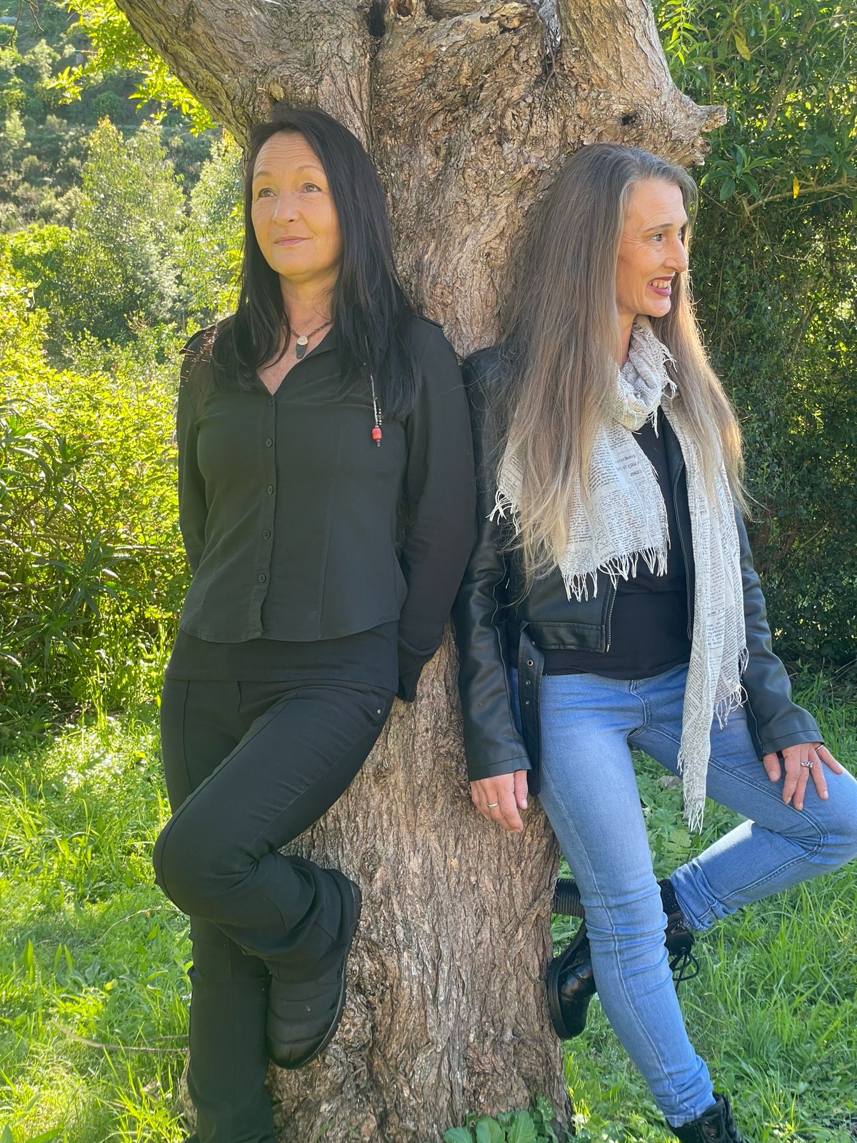 Tracey and Lindie of Lotus Bloom standing together beneath a tree